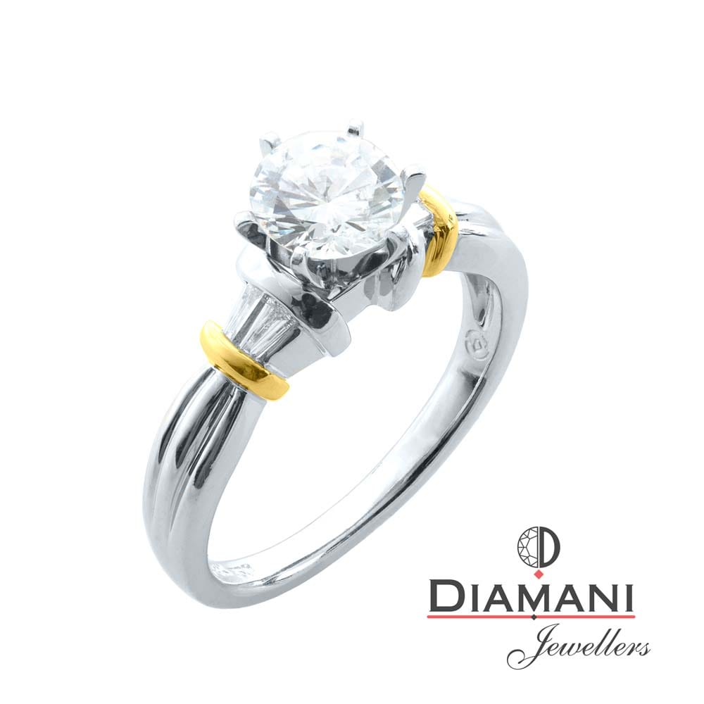 1.14ctw. Round brilliant cut; Solitaire style features Accent Baguette Diamonds in Platinum | DIAMANI Jewellers